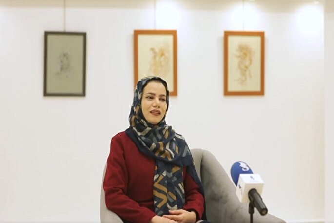 کتابت قرآن بر روی صدف؛ اثر هنرمند همدانی